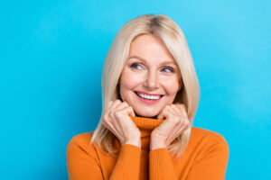 mature woman nice smile implant dentistry bone grafting